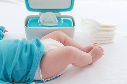 Baby being diapered