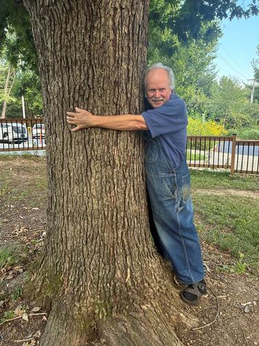 Guy Loftman Hugging Tree